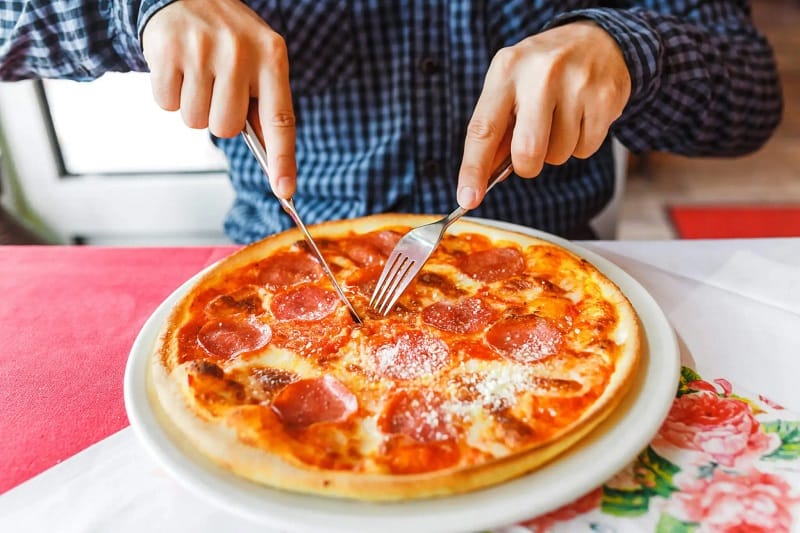 Why Do Italians Eat Pizza With A Fork